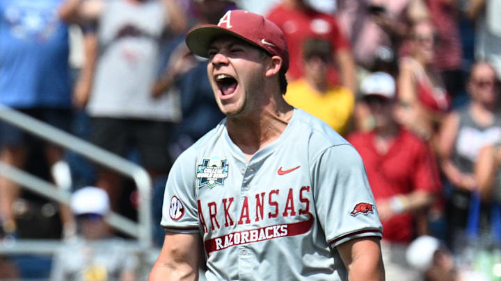 Jun 16, 2025; Omaha, Neb, USA; Arkansas Razorbacks starting pitcher Gage Wood (14) celebrates completing a no hitter against the Murray State Racers at Charles Schwab Field