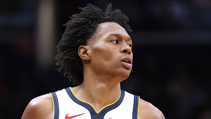 Denver Nuggets forward Peyton Watson (8) looks on