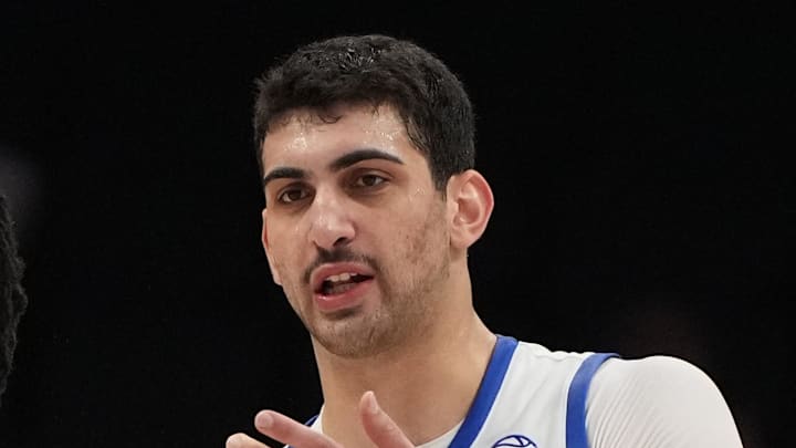 Mar 10, 2026; Charlotte, NC, USA; Southern Methodist University Mustangs center Jaden Toombs (10) with center Samet Yigitoglu (24) in the second half at Spectrum Center. Mandatory Credit: Bob Donnan-Imagn Images