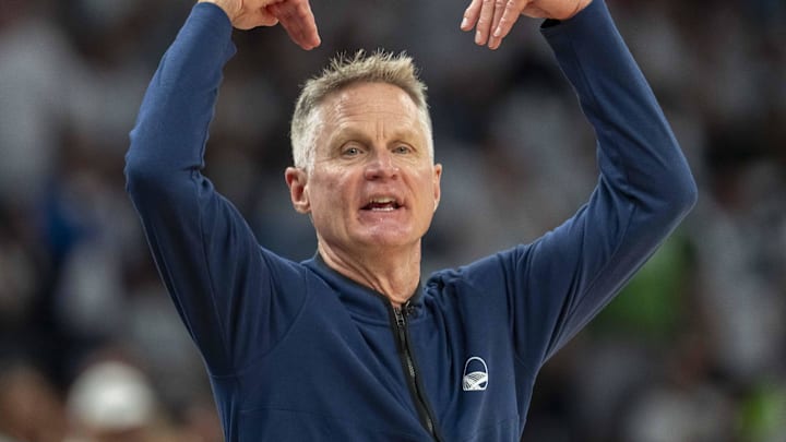May 14, 2025; Minneapolis, Minnesota, USA; Golden State Warriors head coach Steve Kerr reacts against the Minnesota Timberwolves in the second half during game five of the second round for the 2025 NBA Playoffs at Target Center. Mandatory Credit: Jesse Johnson-Imagn Images