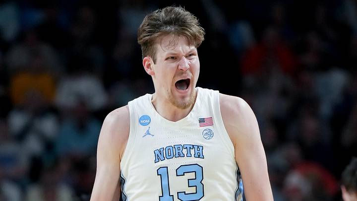 Mar 19, 2026; Greenville, SC, USA; North Carolina Tar Heels center Henri Veesaar (13) celebrates after a play against the VCU Rams in the first half of a first round game of the men's 2026 NCAA Tournament at Bon Secours Wellness Arena. Mandatory Credit: Bob Donnan-Imagn Images