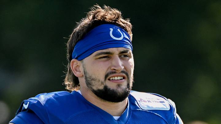 Indianapolis Colts defensive end Caden Curry looks on