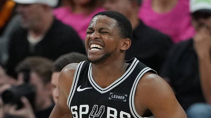 May 22, 2026; San Antonio, Texas, USA; San Antonio Spurs guard De'aaron Fox (4) reacts after an injury against the Oklahoma City Thunder in the second half during game three of the western conference finals for the 2026 NBA playoffs at Frost Bank Center. Mandatory Credit: Daniel Dunn-Imagn Images
