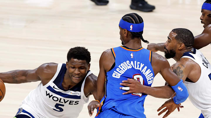 May 28, 2025; Oklahoma City, Oklahoma, USA; Minnesota Timberwolves guard Anthony Edwards (5) drives to the basket against Oklahoma City Thunder guard Shai Gilgeous-Alexander (2) during the third quarter in game five of the western conference finals for the 2025 NBA Playoffs at Paycom Center. Mandatory Credit: Alonzo Adams-Imagn Images May 28, 2025; Oklahoma City, Oklahoma, USA; Minnesota Timberwolves guard Anthony Edwards (5) drives to the basket against Oklahoma City Thunder guard Shai Gilgeous-Alexander (2) during the third quarter in game five of the western conference finals for the 2025 NBA Playoffs at Paycom Center. Mandatory Credit: Alonzo Adams-Imagn Images