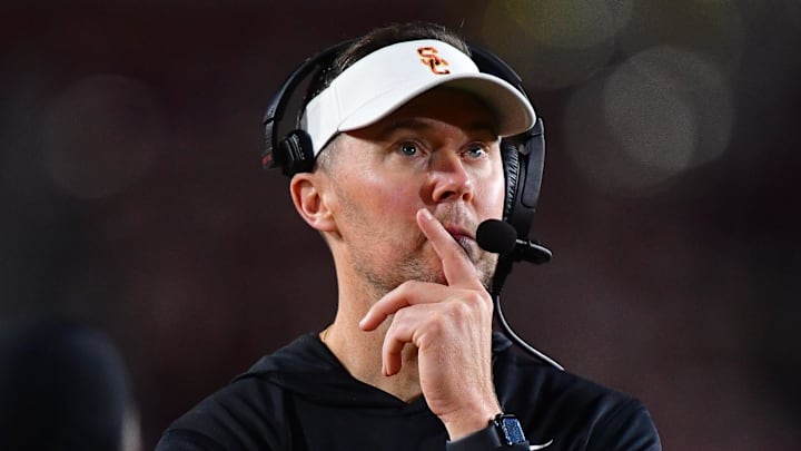 Nov 7, 2025; Los Angeles, California, USA; Southern California Trojans head coach Lincoln Riley watches game action against the Northwestern Wildcats during the second half at the Los Angeles Memorial Coliseum. 