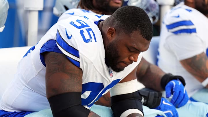 Dallas Cowboys defensive tackle Kenny Clark reacts on the bench in the second half against the Denver Broncos at Mile High 