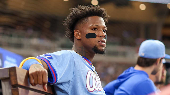 Apr 11, 2026; Atlanta, Georgia, USA; Atlanta Braves right fielder Ronald Acuna Jr. (13) in the dugout against the Cleveland Guardians in the fourth inning at Truist Park. Mandatory Credit: Brett Davis-Imagn Images
