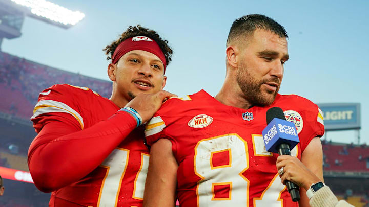 Oct 22, 2023; Kansas City, Missouri, USA; Kansas City Chiefs quarterback Patrick Mahomes (15) joins tight end Travis Kelce (87) as he talks with reporter Tracy Wolfson after defeating the Los Angeles Chargers at GEHA Field at Arrowhead Stadium. Mandatory Credit: Jay Biggerstaff-Imagn Images Oct 22, 2023; Kansas City, Missouri, USA; Kansas City Chiefs quarterback Patrick Mahomes (15) joins tight end Travis Kelce (87) as he talks with reporter Tracy Wolfson after defeating the Los Angeles Chargers at GEHA Field at Arrowhead Stadium. Mandatory Credit: Jay Biggerstaff-Imagn Images