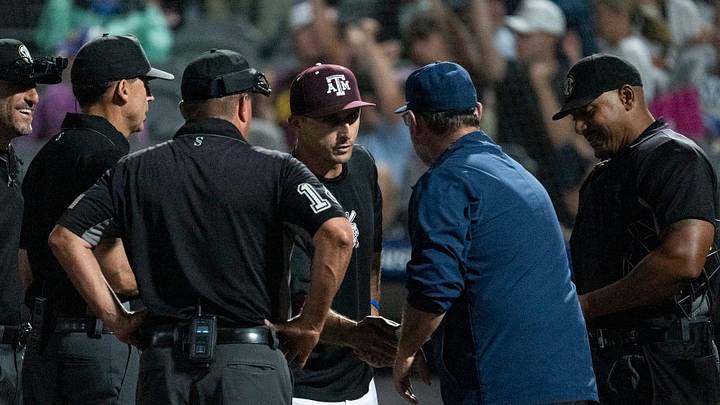 Texas A&M Aggies head coach Michael Earley and Auburn Tigers head coach Butch Thompson shake hands as the Tigers take on the Aggies during the SEC baseball tournament at Hoover Metropolitan Stadium in Hoover, Ala., on Friday, May 22, 2026.