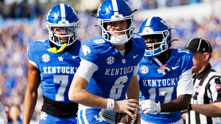 Nov 15, 2025; Lexington, Kentucky, USA; Kentucky Wildcats quarterback Cutter Boley (8) celebrates after scoring a touchdown during the first quarter against the Tennessee Tech Golden Eagles at Kroger Field. Mandatory Credit: Jordan Prather-Imagn Images