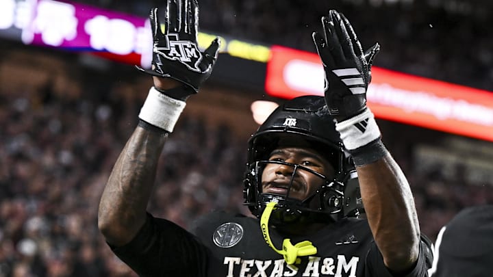 Oct 4, 2025; College Station, Texas, USA; Texas A&M Aggies wide receiver KC Concepcion (7) reacts after scoring a touchdown during the third quarter against the Mississippi State Bulldogs at Kyle Field. Mandatory Credit: Maria Lysaker-Imagn Images 