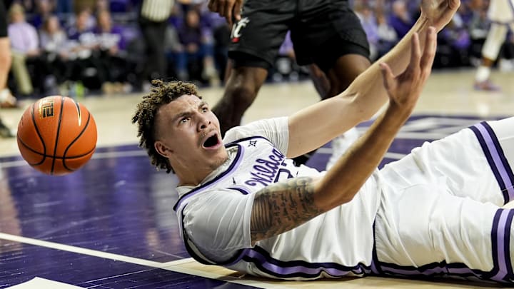 Dec 30, 2024; Manhattan, Kansas, USA; Kansas State Wildcats guard Coleman Hawkins (33) reacts during the second half against the Cincinnati Bearcats at Bramlage Coliseum. Mandatory Credit: Jay Biggerstaff-Imagn Images