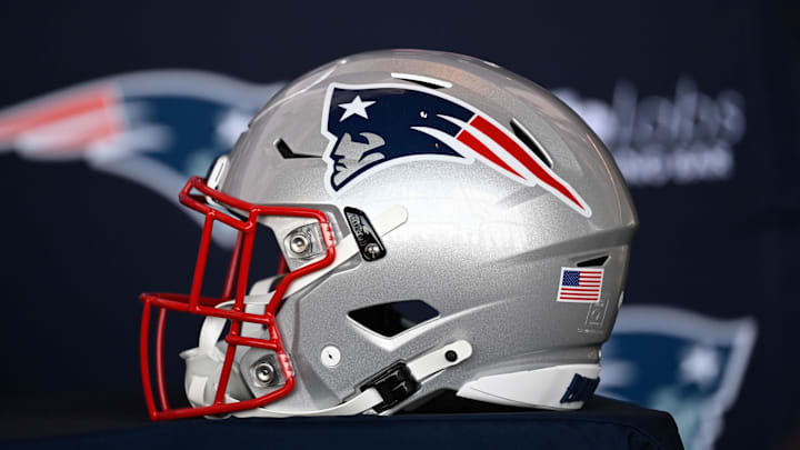 Jan 17, 2024; Foxborough, MA, USA; A New England Patriots helmet sits on a table prior to a press conference at Gillette Stadium. Mandatory Credit: Eric Canha-Imagn Images