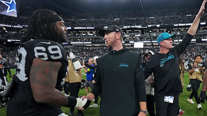 Nov 2, 2025; Paradise, Nevada, USA; The Jacksonville Jaguars head coach Liam Coen waves to fans after the win against the Las Vegas Raiders at Allegiant Stadium. Mandatory Credit: Kirby Lee-Imagn Images