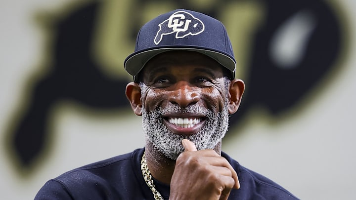 Apr 4, 2025; Boulder, CO, USA; Colorado Buffaloes head coach Deion Sanders watches as his players go through drills at the University of Colorado NFL Showcase at the CU Indoor Practice Facility. Mandatory Credit: Michael Ciaglo-Imagn Images