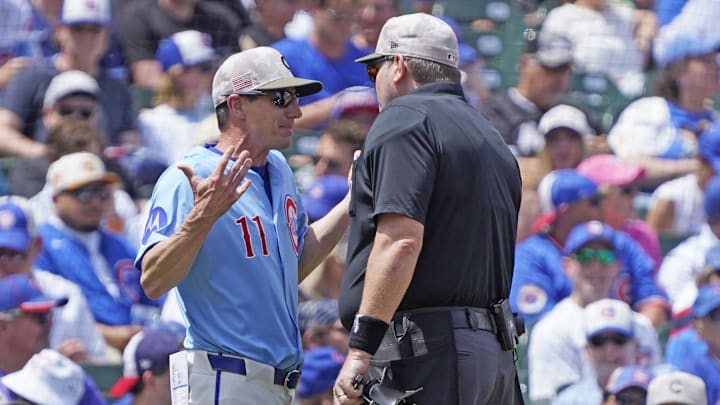 May 16, 2025; Chicago, Illinois, USA; Chicago Cubs manager Craig Counsell (11) argues a call with umpire Chris Conroy (98) in a game against the Chicago White Sox during the first inning at Wrigley Field. 