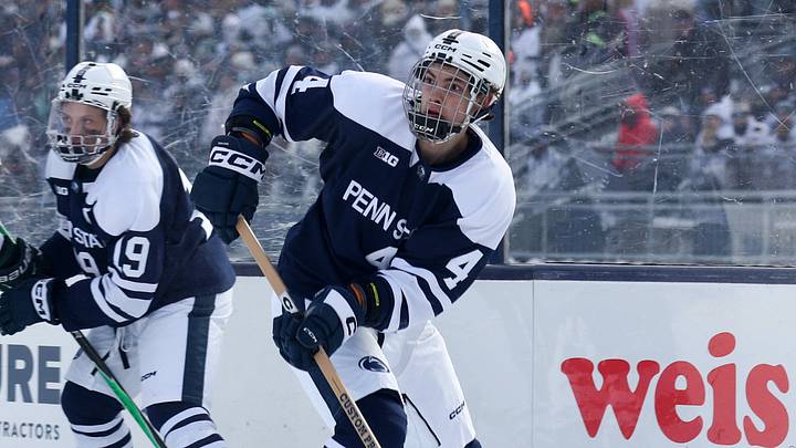 Jan 31, 2026; State College, PA, USA; Penn State Nittany Lions defenseman Mac Gadowsky (4) looks to pass the puck during the second period against the Michigan State Spartans at Beaver Stadium. Mandatory Credit: Matthew O'Haren-Imagn Images Jan 31, 2026; State College, PA, USA; Penn State Nittany Lions defenseman Mac Gadowsky (4) looks to pass the puck during the second period against the Michigan State Spartans at Beaver Stadium. Mandatory Credit: Matthew O'Haren-Imagn Images