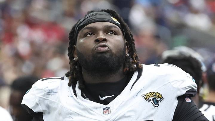 Sep 29, 2024; Houston, Texas, USA; Jacksonville Jaguars offensive tackle Anton Harrison (77) during the game against the Houston Texans at NRG Stadium. Mandatory Credit: Troy Taormina-Imagn Images
