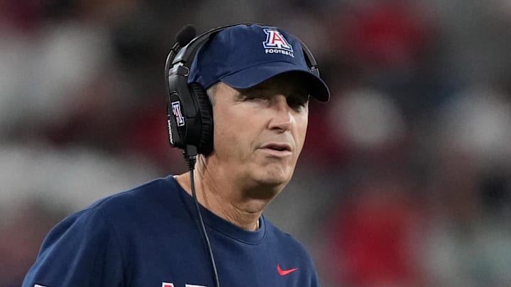 Jan 2, 2026; San Diego, CA, USA; Arizona Wildcats head coach Brent Brennan reacts against the SMU Mustangs in the first half during the Holiday Bowl at Snapdragon Stadium. Mandatory Credit: Kirby Lee-Imagn Images