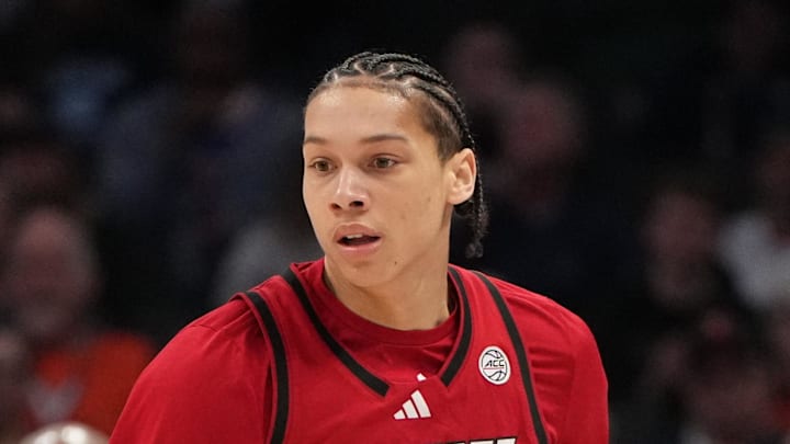 Mar 12, 2026; Charlotte, NC, USA; NC State Wolfpack guard Matt Able (3) brings the ball up the court in the first half at Spectrum Center. Mandatory Credit: Bob Donnan-Imagn Images