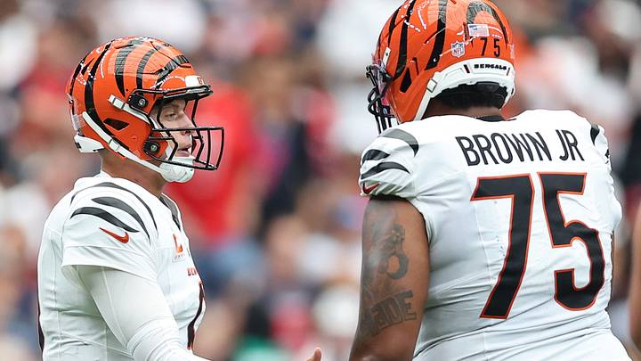 Sep 20, 2026; Houston, Texas, USA; Cincinnati Bengals quarterback Joe Burrow (9) celebrates with offensive tackle Amarius Mims (71) and offensive tackle Orlando Brown Jr. (75) after a touchdown during the third quarter against the Houston Texans at Reliant Stadium. Mandatory Credit: Troy Taormina-Imagn Images Sep 20, 2026; Houston, Texas, USA; Cincinnati Bengals quarterback Joe Burrow (9) celebrates with offensive tackle Amarius Mims (71) and offensive tackle Orlando Brown Jr. (75) after a touchdown during the third quarter against the Houston Texans at Reliant Stadium. Mandatory Credit: Troy Taormina-Imagn Images