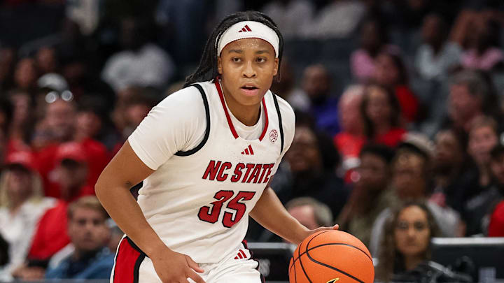Nov 9, 2025; Charlotte, North Carolina, USA; NC State Wolfpack guard Zoe Brooks (35) dribbles the ball against the Southern California Trojans during the second quarter of the Ally Tipoff game at Spectrum Center. Mandatory Credit: Cory Knowlton-Imagn Images Nov 9, 2025; Charlotte, North Carolina, USA; NC State Wolfpack guard Zoe Brooks (35) dribbles the ball against the Southern California Trojans during the second quarter of the Ally Tipoff game at Spectrum Center. Mandatory Credit: Cory Knowlton-Imagn Images