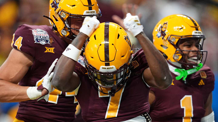 Arizona State Sun Devils linebacker Keyshaun Elliott (44) and defensive back Keith Abney II (1) celebrate after a safety 