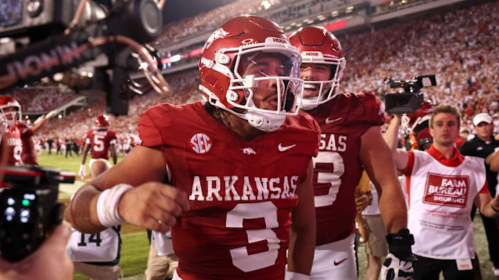 Arkansas Razorbacks quarterback Malachi Singleton (3) celebrates after scoring a touchdown in the fourth quarter against the Tennessee Volunteers at Donald W. Reynolds Razorback Stadium. Arkansas won 19-14. Arkansas Razorbacks quarterback Malachi Singleton (3) celebrates after scoring a touchdown in the fourth quarter against the Tennessee Volunteers at Donald W. Reynolds Razorback Stadium. Arkansas won 19-14.