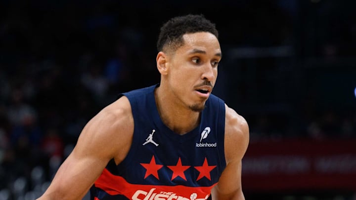Washington Wizards guard Malcolm Brogdon handles the ball during the first quarter against the San Antonio Spurs. Washington Wizards guard Malcolm Brogdon handles the ball during the first quarter against the San Antonio Spurs.