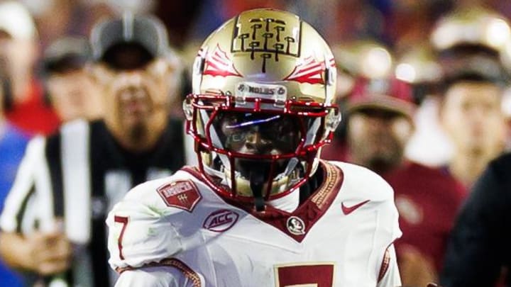 Nov 29, 2025; Gainesville, Florida, USA; Florida State Seminoles wide receiver Lawayne McCoy (7) runs against Florida Gators defensive back Alfonzo Allen Jr. (43) during the second half at Ben Hill Griffin Stadium. Mandatory Credit: Matt Pendleton-Imagn Images Nov 29, 2025; Gainesville, Florida, USA; Florida State Seminoles wide receiver Lawayne McCoy (7) runs against Florida Gators defensive back Alfonzo Allen Jr. (43) during the second half at Ben Hill Griffin Stadium. Mandatory Credit: Matt Pendleton-Imagn Images