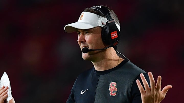 Sep 20, 2025; Los Angeles, California, USA; Southern California Trojans head coach Lincoln Riley watches game action against the Michigan State Spartans during the second half at the Los Angeles Memorial Coliseum. Sep 20, 2025; Los Angeles, California, USA; Southern California Trojans head coach Lincoln Riley watches game action against the Michigan State Spartans during the second half at the Los Angeles Memorial Coliseum.