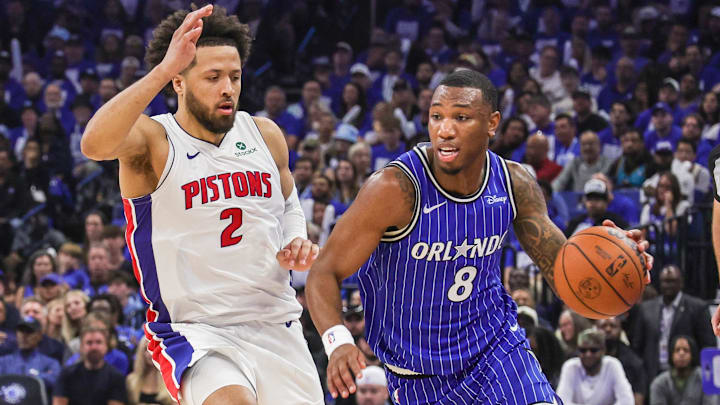 Apr 27, 2026; Orlando, Florida, USA; Orlando Magic forward Jamal Cain (8) drives around Detroit Pistons guard Cade Cunningham (2) during the second half during game four of the first round of the 2026 NBA Playoffs at Kia Center. Mandatory Credit: Mike Watters-Imagn Images