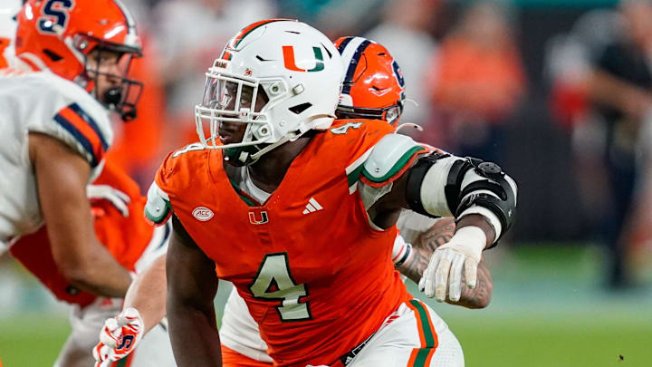 Nov 8, 2025; Miami Gardens, Florida, USA; Miami Hurricanes defensive lineman Rueben Bain Jr. (4) rushes the passer against the Syracuse Orange during the third quarter at Hard Rock Stadium. Mandatory Credit: Jeff Romance-Imagn Images
