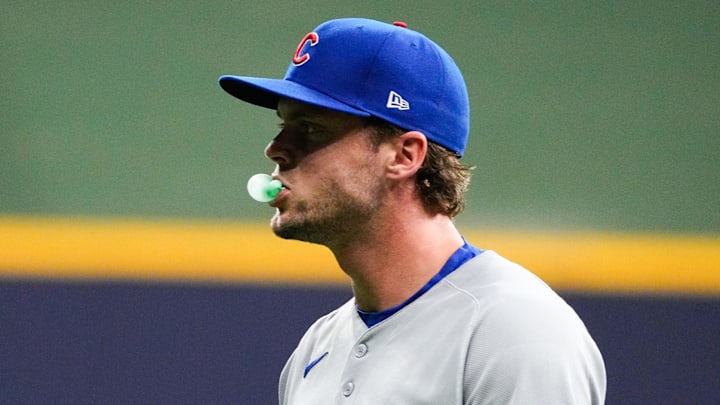 Chicago Cubs second baseman Nico Hoerner blows a bubble with bubble gum before a game Chicago Cubs second baseman Nico Hoerner blows a bubble with bubble gum before a game