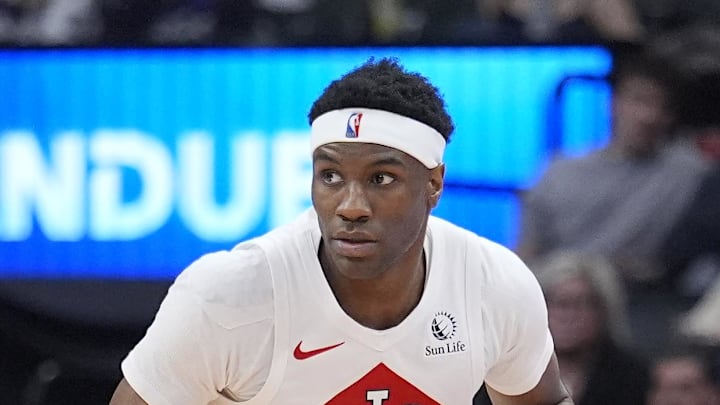 Toronto Raptors guard Ja'Kobe Walter dribbles up the court against the Detroit Pistons.