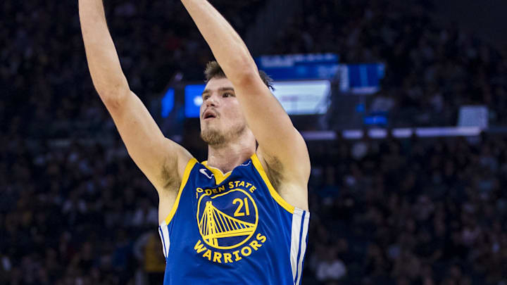 Mar 10, 2025; San Francisco, California, USA; Golden State Warriors center Quinten Post (21) takes a three-point shot against the Portland Trail Blazers during the second quarter at Chase Center. Mandatory Credit: John Hefti-Imagn Images