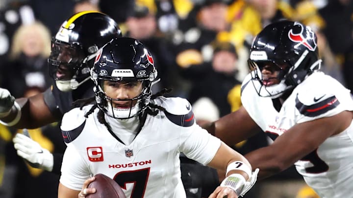 Jan 12, 2026; Pittsburgh, PA, USA; Houston Texans quarterback C.J. Stroud (7) scrambles during the first half of an AFC Wild Card Round game against the Pittsburgh Steelers at Acrisure Stadium. Mandatory Credit: Charles LeClaire-Imagn Images