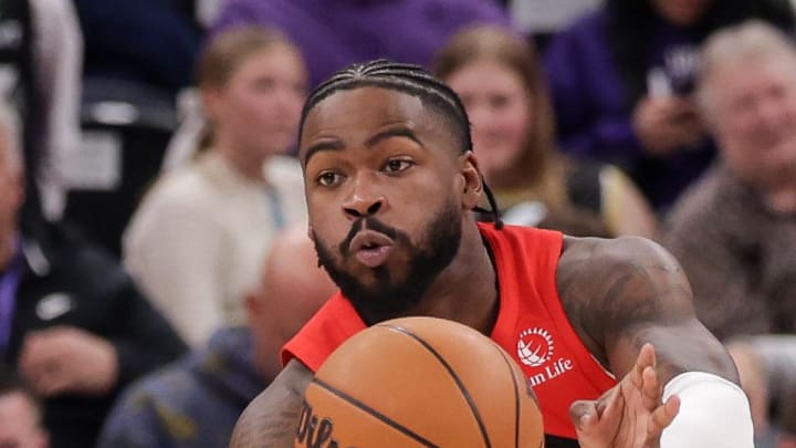 Toronto Raptors guard Jamal Shead passes the ball up the court during the second half against the Utah Jazz.