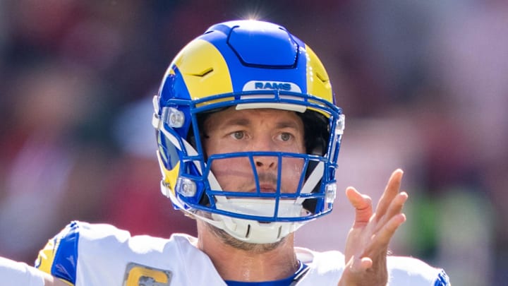 November 9, 2025; Santa Clara, California, USA; Los Angeles Rams quarterback Matthew Stafford (9) warms up in front of head coach Sean McVay (right) before the game against the San Francisco 49ers at Levi's Stadium. Mandatory Credit: Kyle Terada-Imagn Images