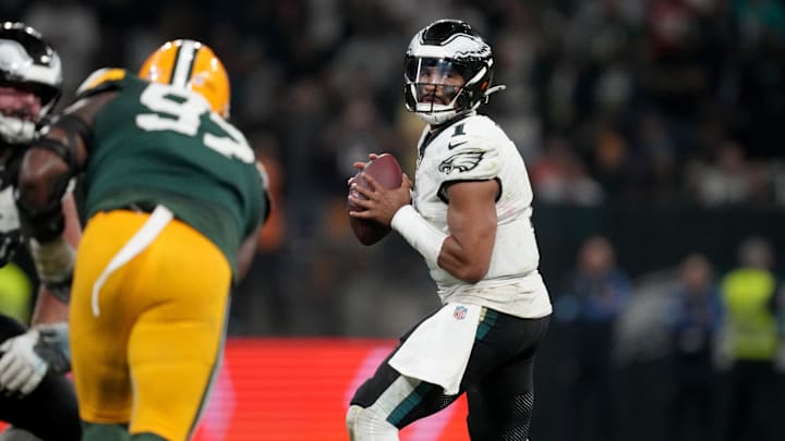 Sep 6, 2024; Sao Paulo, BRA; Philadelphia Eagles quarterback Jalen Hurts (1) drops to throw during the first half against the Green Bay Packers at Neo Quimica Arena. Mandatory Credit: Kirby Lee-Imagn Images