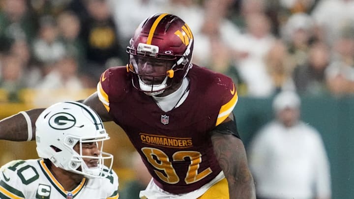 Sep 11, 2025; Green Bay, Wisconsin, USA; Washington Commanders defensive end Dorance Armstrong (92) sacks Green Bay Packers quarterback Jordan Love (10) in the fourth quarter at Lambeau Field. Mandatory Credit: Jeff Hanisch-Imagn Images Sep 11, 2025; Green Bay, Wisconsin, USA; Washington Commanders defensive end Dorance Armstrong (92) sacks Green Bay Packers quarterback Jordan Love (10) in the fourth quarter at Lambeau Field. Mandatory Credit: Jeff Hanisch-Imagn Images