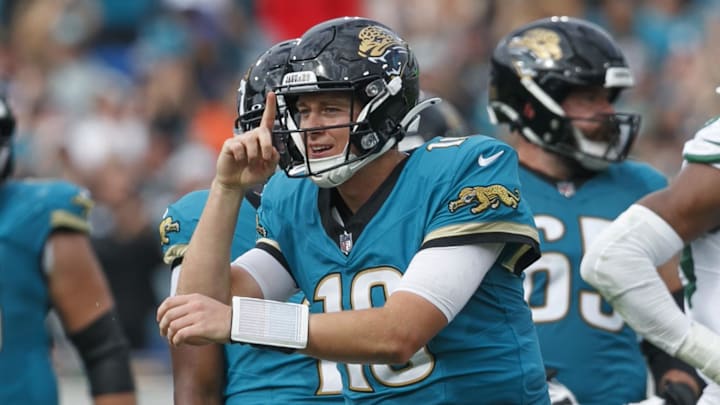 Dec 15, 2024; Jacksonville, Florida, USA; Jacksonville Jaguars quarterback Mac Jones (10) reacts after a first down run against the New York Jets during the second quarter at EverBank Stadium. Mandatory Credit: Morgan Tencza-Imagn Images