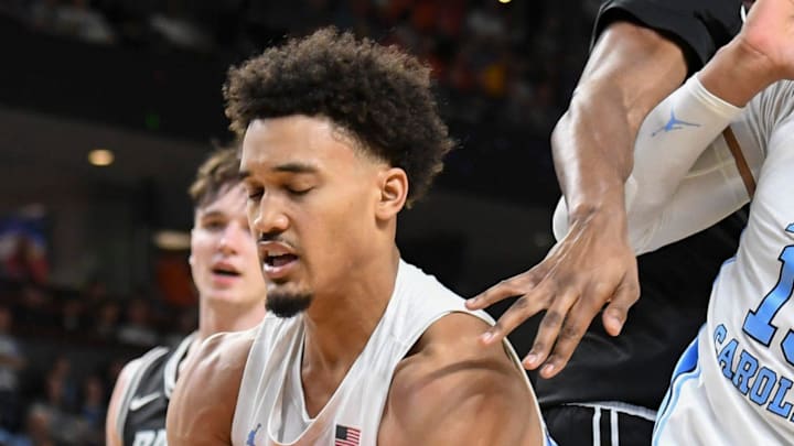 North Carolina Tar Heels guard Seth Trimble (7) rebounds the ball Thursday, March 19, 2026, during the NCAA Men’s Basketball Tournament first round game against the VCU Rams at Bon Secours Wellness Arena in Greenville, South Carolina. VCU Rams won 82-78 in OT.