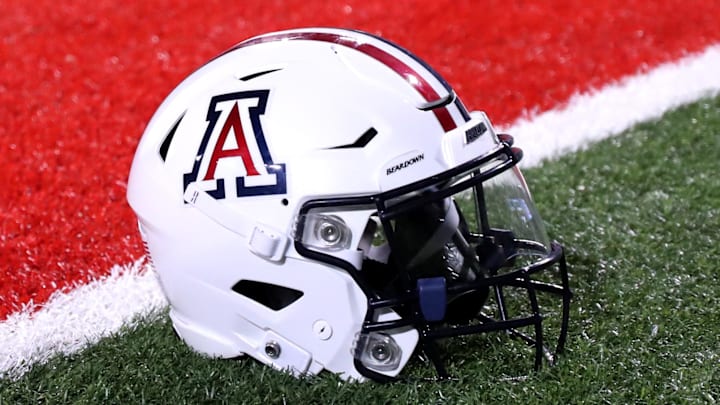 Sep 2, 2023; Tucson, Arizona, USA; Arizona Wildcats quarterback Jayden de Laura (7) helmet on the field after a victory over Northern Arizona Lumberjacks at Arizona Stadium. Mandatory Credit: Zac BonDurant-Imagn Images