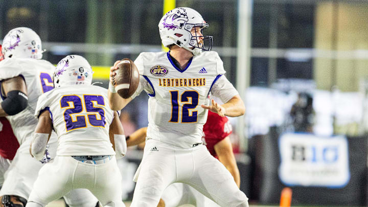 Sep 6, 2024; Bloomington, Indiana, USA; Western Illinois Leathernecks quarterback Nathan Lamb (12) passes the ball in the second half against the Indiana Hoosiers at Memorial Stadium. Mandatory Credit: Trevor Ruszkowski-Imagn Images Sep 6, 2024; Bloomington, Indiana, USA; Western Illinois Leathernecks quarterback Nathan Lamb (12) passes the ball in the second half against the Indiana Hoosiers at Memorial Stadium. Mandatory Credit: Trevor Ruszkowski-Imagn Images