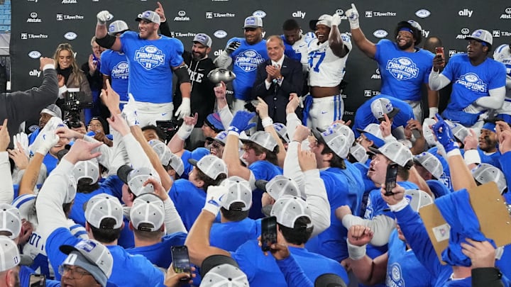Dec 6, 2025; Charlotte, NC, USA; Duke Blue Devils players celebrate after winning the  ACC Championship game at Bank of America Stadium. Mandatory Credit: Bob Donnan-Imagn Images