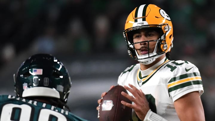 Green Bay Packers quarterback Jordan Love (10) drops back to pass against the Philadelphia Eagles during their playoff game. Green Bay Packers quarterback Jordan Love (10) drops back to pass against the Philadelphia Eagles during their playoff game.