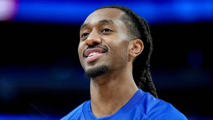 Daniss Jenkins #24 of the Detroit Pistons looks on and smiles before the game against the Toronto Raptors. (Photo by Nic Antaya/Getty Images) Daniss Jenkins #24 of the Detroit Pistons looks on and smiles before the game against the Toronto Raptors. (Photo by Nic Antaya/Getty Images)