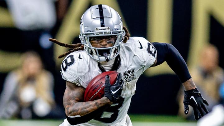 Dec 29, 2024; New Orleans, Louisiana, USA;  Las Vegas Raiders running back Ameer Abdullah (8) rushes against New Orleans Saints cornerback Travion Fluellen (26) during the second half at Caesars Superdome. Mandatory Credit: Stephen Lew-Imagn Images