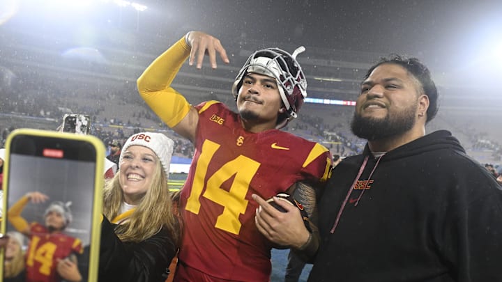 Nov 23, 2024; Pasadena, California, USA;  USC Trojans quarterback Jayden Maiava (14) celebrates the win over UCLA at Rose Bowl. 